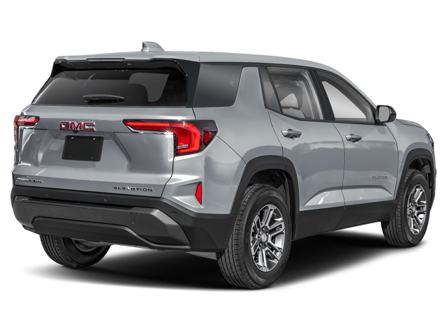 An orange Chevrolet Corvette Z06 sports car on an asphalt road at sunset.